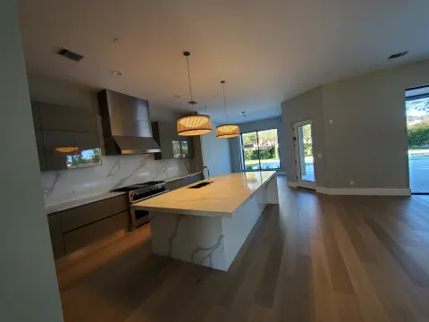 Wired and lit modern kitchen and great room